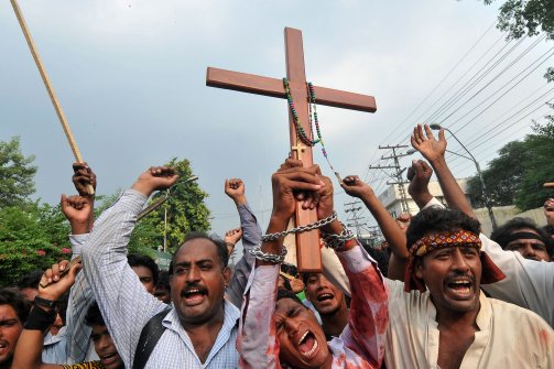 akistanis protest against violence against Christians in Lahore on Sept. 24, 2013. (Arif Ali/AFP/Getty Images) 